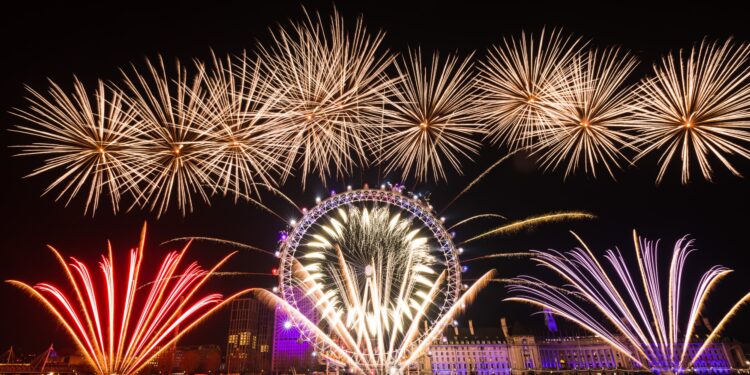 LONDON, UNITED KINGDOM - JANUARY 01: Fireworks light up the sky above the London Eye during the new year celebrations in London, United Kingdom on January 01, 2020.  (Photo by Vickie Flores/Anadolu Agency via Getty Images)
